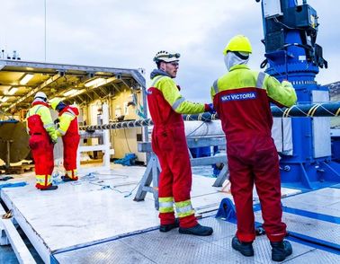 Working people with cable on NKT Victoria